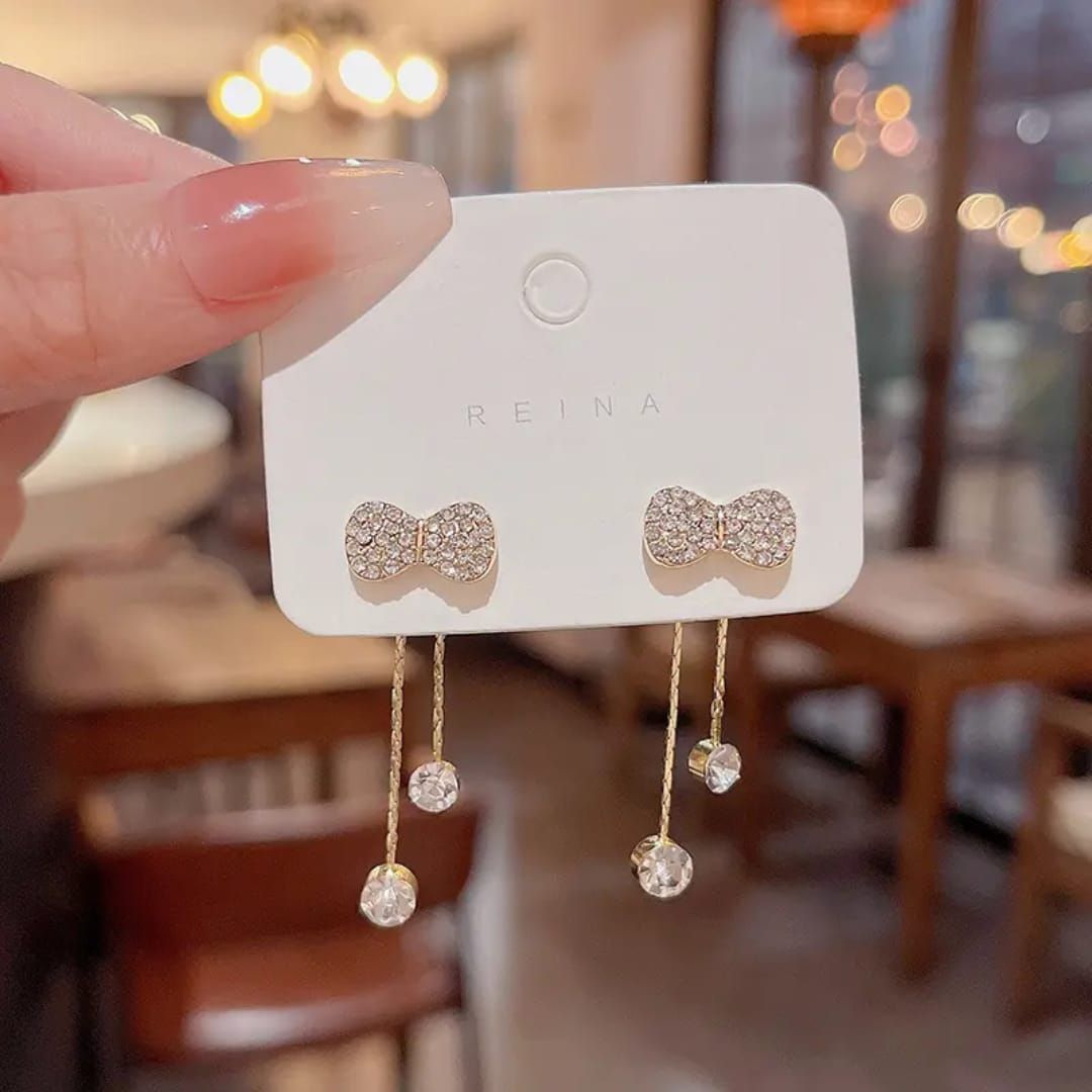 Take A Bow Long Chain Earrings