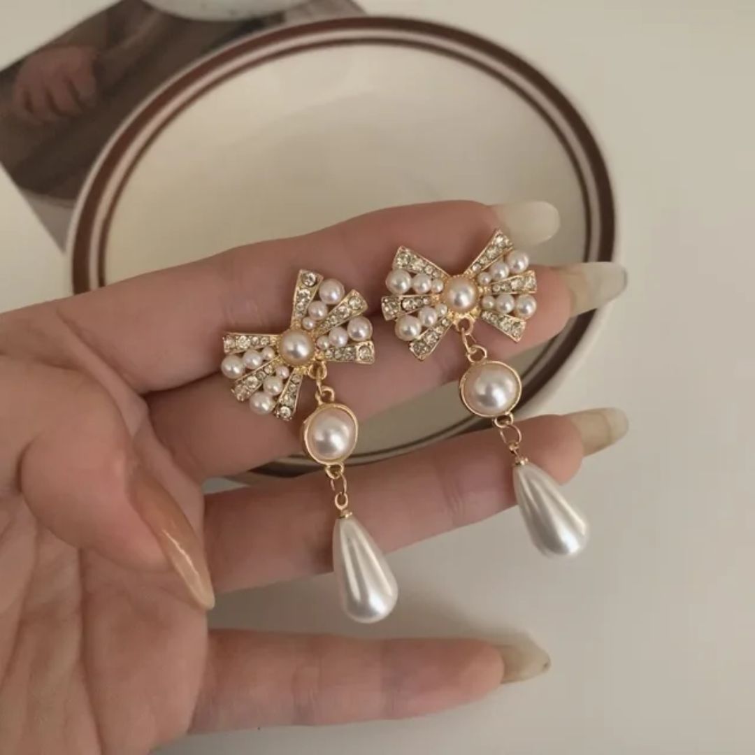 Pearly Bow Statement Earrings