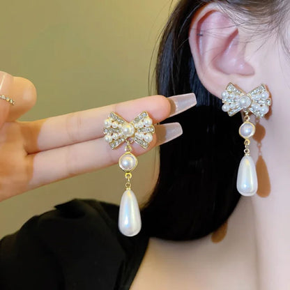 Pearly Bow Statement Earrings