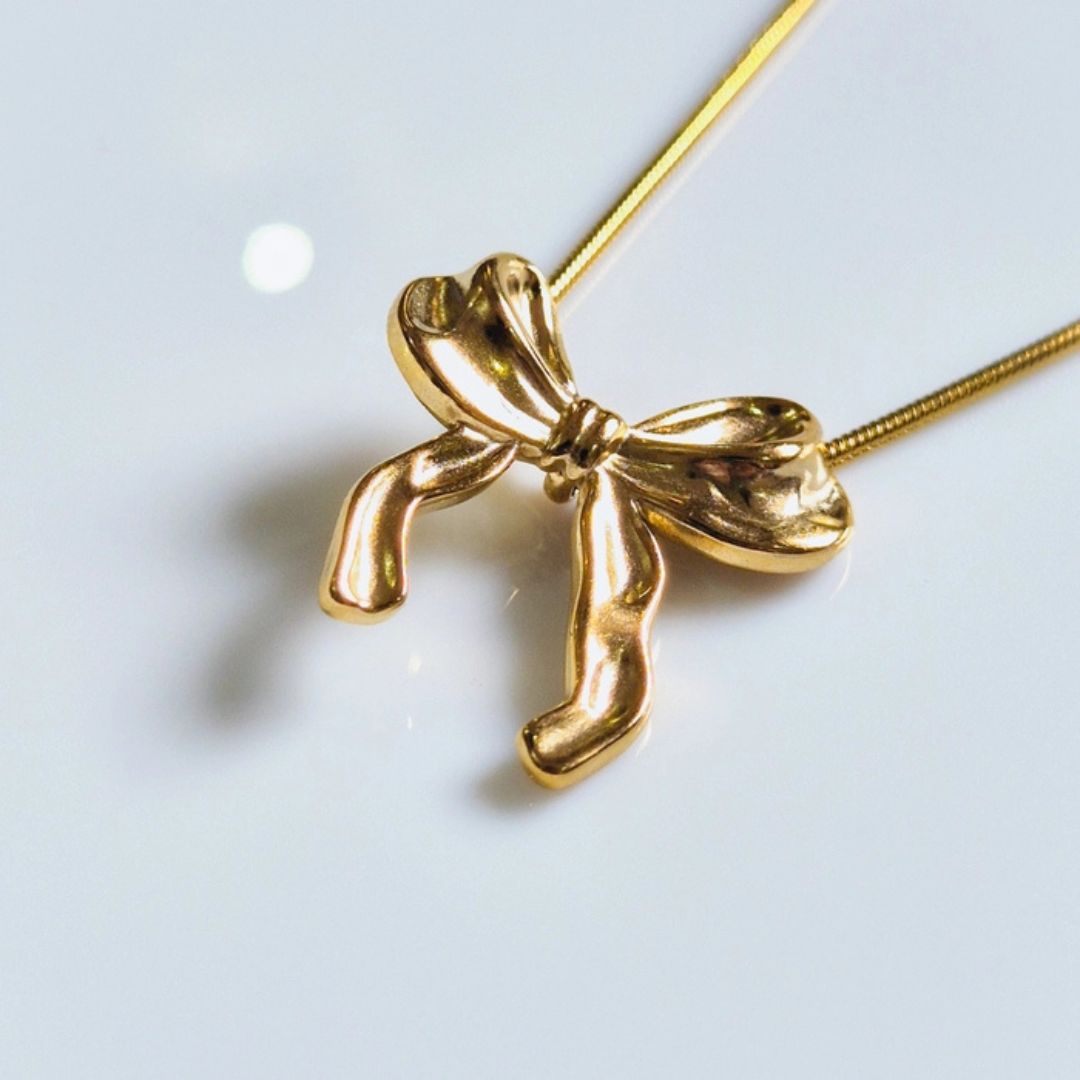 Golden Bow Delight Neckpiece