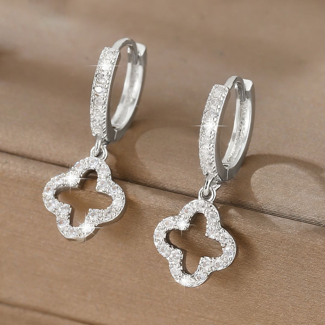 Radiant Twist Silver Earrings