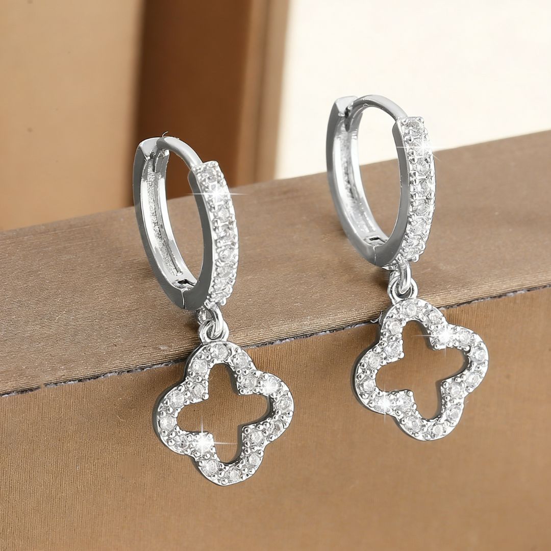 Radiant Twist Silver Earrings