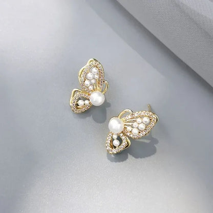 Take A Bow Stud Earrings