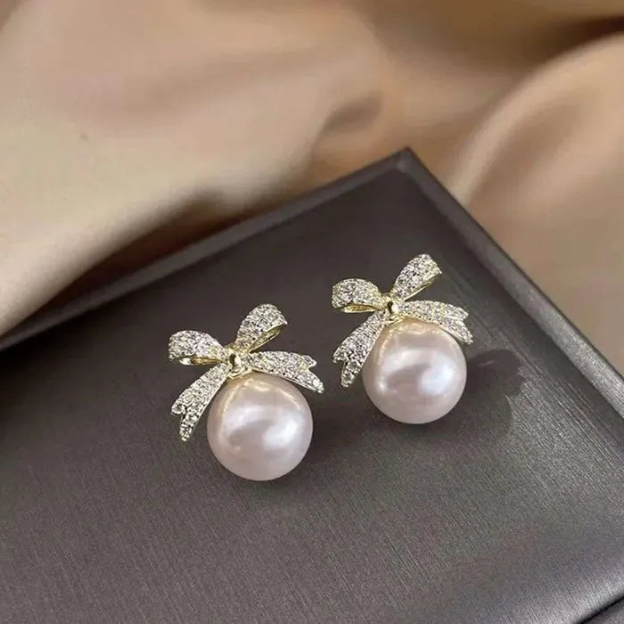 Perky Pearl Bow Stud Earrings