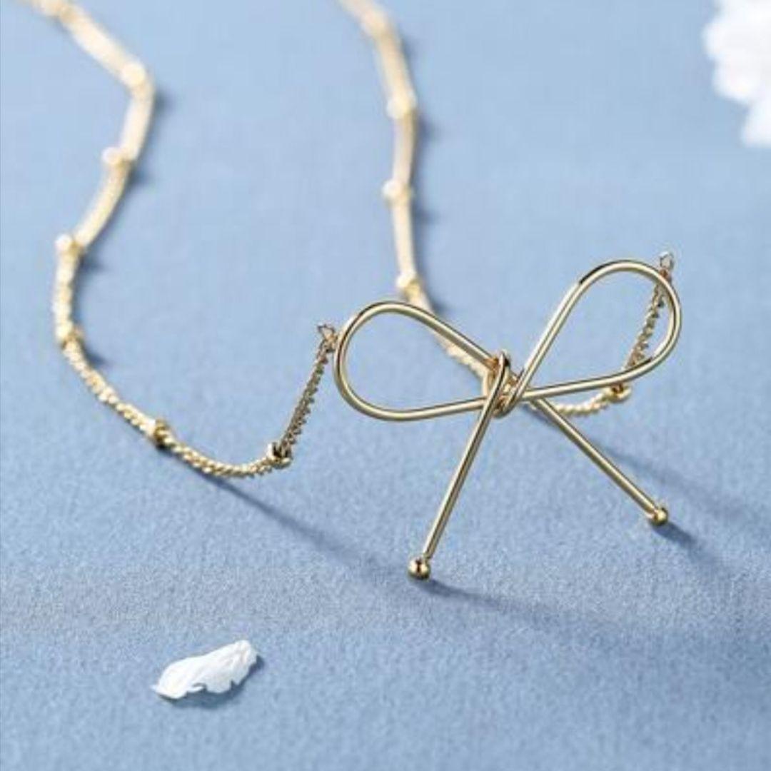Golden Bow Neckpiece