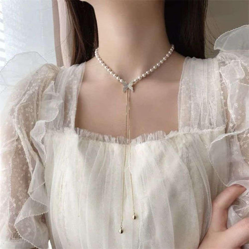 Perky Pearl Butterfly NeckPiece