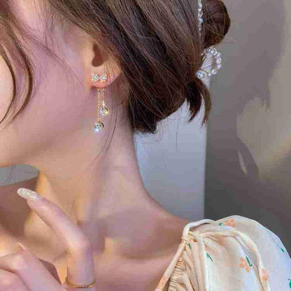 Take A Bow Long Chain Earrings